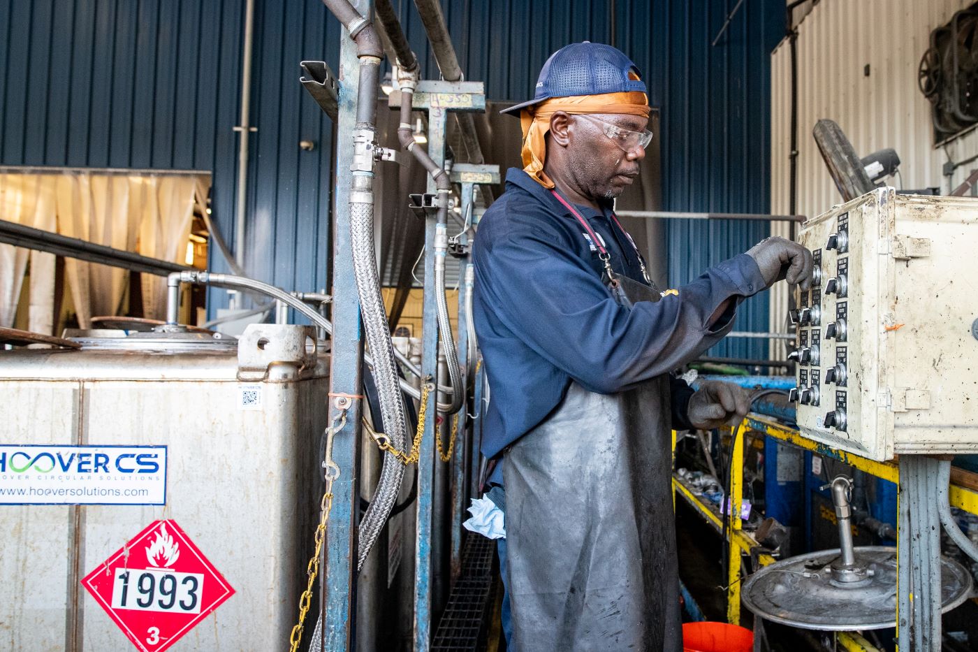 Hoover CS Technician Wearing PPE During IBC Tank Wash